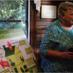 Mary Ruble speaks at an Appalachian Voices event to present more than 1,000 signatures from Blue Ridge Electric members supporting access to "on-bill" financing