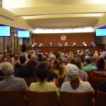 Members of the Buckingham County Planning Commission look over a packed room of people speaking out against the Atlantic Coast Pipeline compressor station.