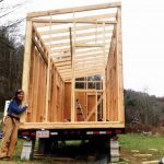 Sarah Kellogg with her tiny house frame