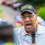 Protestor speaks at protest