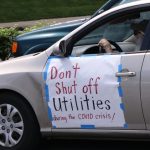 protester in car