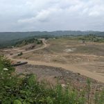 A desolate patch of disturbed ground sits as a result of an abandoned surface mine.