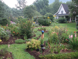 Mulched flower beds offset the lawn areas at Sunflower Farm vacation rental in Barnardsville, N.C. Photo by Joan Naylor